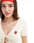 Pieces tie front embroidered strawberry top co-ord with contrast red trim in cream