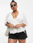 Фото #3 товара ASOS DESIGN Curve dobby wrap short sleeve blouse with pleated peplum hem in ivory