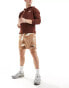 The North Face Glacier fleece shorts in brown geo print Exclusive at ASOS