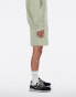 New Balance Iconic collegiate fleece short 7" in green