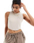 Фото #1 товара Nike Essential ribbed cropped tank top in beige