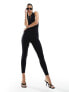 Фото #5 товара In The Style zip through sleevless unitard jumpsuit in black