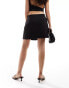 Фото #3 товара In The Style pocket detail tie side mini skirt in black