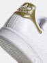 adidas Originals Stan Smith trainers in white/gold