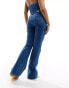 Фото #2 товара Tommy Jeans Sylvia high waisted flared jeans in mid wash