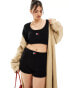 Фото #1 товара Tommy Jeans badge knit shorts in black