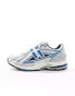 New Balance 1906 trainers in silver and blue