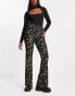 Фото #4 товара QED London flare trousers in black floral