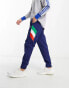 Фото #1 товара adidas Football – Italy Icons – Jogginghose aus Webstoff in Marineblau