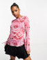 Monki long sleeve boat neck top in red and pink rose print