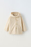 Hooded water-repellent buttoned parka