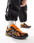 New Balance 610 trainers in orange