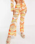 Фото #1 товара New Girl Order festival knit tie front flare trousers co-ord in orange