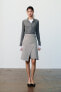 Midi skirt with buckle