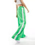 Фото #1 товара ASOS DESIGN pull on trouser with contrast panel in bright green