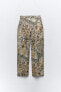 Straight fit snakeskin print trousers