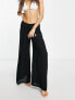 Фото #3 товара ASOS DESIGN Petite drawstring palazzo beach trouser in black