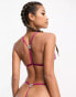 Фото #4 товара ASOS DESIGN Flutter lace cut-out thong in magenta