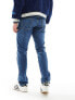 Фото #5 товара Levi's 502 taper fit jeans in mid blue