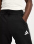 Фото #2 товара adidas Football Tiro tracksuit joggers in black