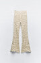 Flared crochet trousers