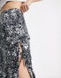 ASOS DESIGN bow detail midi skirt with thigh split in mono smudge print