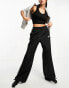 Фото #1 товара ASOS 4505 Running Club woven track pant with graphic in black