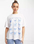 Фото #1 товара ASOS DESIGN oversized heavy weight t-shirt in butterflies graphic in white