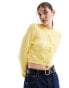 Фото #1 товара ASOS DESIGN crew neck cropped cardigan with pocket in cotton blend in lemon