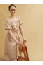 Фото #1 товара Платье с открытой спиной коротким рукавом с пуговицами и поясом Koton Omzu Açık