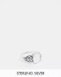 ASOS DESIGN sterling silver signet ring with lion design in burnished silver