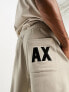 Armani Exchange logo joggers in beige mix and match