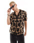 ASOS DESIGN knitted short sleeve button through polo in leopard print