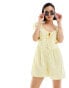 Фото #1 товара ASOS DESIGN dobby playsuit with corset waist in lemon