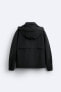 Hooded technical jacket