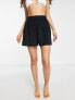 ASOS DESIGN Petite textured beach short co-ord in black