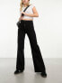 Фото #1 товара & Other Stories high waist flared leg jeans with button front detail and patch pockets in black