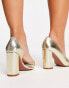 Фото #2 товара ASOS DESIGN Wide Fit Winston d'orsay high heeled shoes in gold