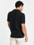 Levi's polo shirt in black with small logo