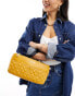 Love Moschino top handle quilted bag in mustard