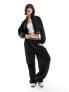 Фото #1 товара Tommy Jeans baggy taping trackpants in black