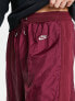 Фото #3 товара Nike Circa Premium winter textured casual trousers dark beetroot red