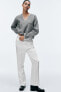 Cropped knit sweater with contrast topstitching