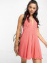 Фото #1 товара ASOS DESIGN crinkle jersey halter playsuit in coral