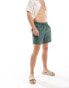 Фото #3 товара ASOS DESIGN swim shorts in mid length with cargo pockets in khaki