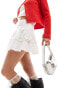 Фото #1 товара COLLUSION cotton crinkle flippy mini skirt with ribbon detail in white