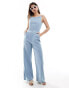 ASOS DESIGN soft denim tie back jumpsuit in mid blue