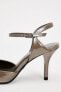 Heeled shoes with ankle strap