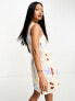 ASOS DESIGN linen sweetheart mini dress with button detail in abstract print