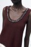 PLAIN KNIT TOP WITH RHINESTONE BEADS